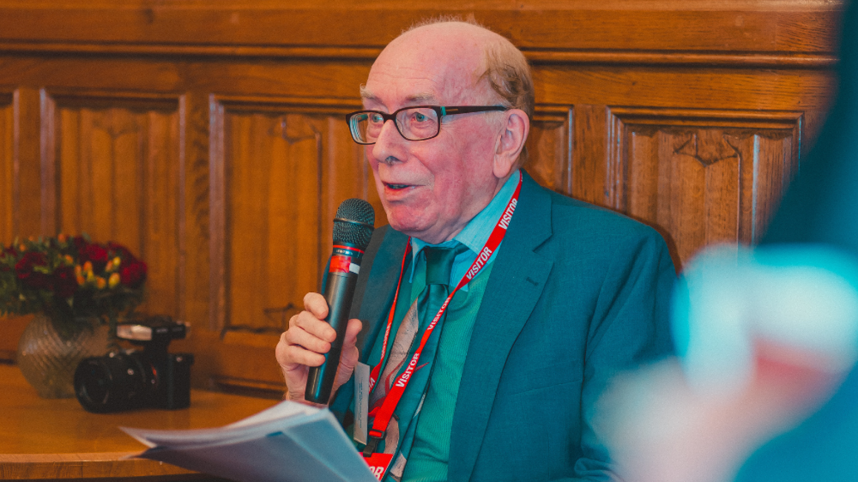 Professor Peter Smith talking into a mic