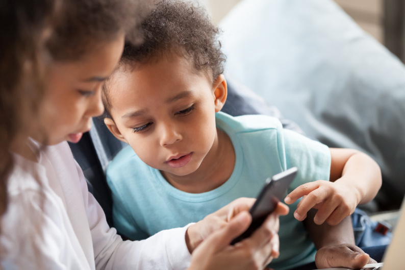 Two young people on a mobile phone