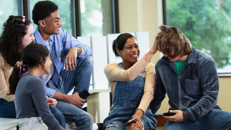 Young people laughing together